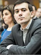  ?? BRENDAN SMIALOWSKI/GETTY-AFP ?? A lawmaker told entreprene­ur Martin Shkreli, 32, to wipe the smile off his face Thursday.