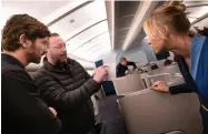  ??  ?? The Flight Attendant showrunner Steve Yockey (center) with actors Michiel Huisman and Kaley Cuoco.