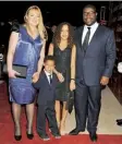  ??  ?? Mcqueen with his wife, Bianca Stigter, and their children, Alex and Dexter, in 2014.Meeting the Queen during a reception for the dramatic arts at Buckingham Palace in the same year.At the Oscars after 12 Years a Slave won Best Picture