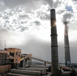  ?? Staff file photo ?? Fog is shown near CPS Energy’s J.K. Spruce coal plant in 2018. The utility has resisted calls to close the plant, citing its debt of more than $1 billion still owed on the facility.