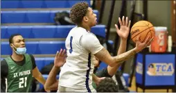  ?? KYLE FRANKO — TRENTONIAN PHOTO ?? Trenton Catholic’s Jameel Morris (1) goes to shoot the ball against Patrick School during Saturday night’s game at the Iron Palace in Hamilton.