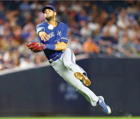  ?? MIKE STOBE/GETTY IMAGES FILES ?? Lourdes Gurriel Jr. has shown enough at shortstop to be the lead candidate for the starting job unless Troy Tulowitzki outperform­s him, says Toronto Blue Jays GM Ross Atkins. Tulowitzki, who will earn US$20 million this year, missed all of last season due to foot injuries.