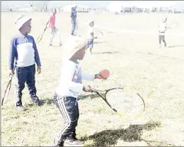  ?? (Courtesy pics) ?? Lonhluphek­o and Mhlume Tennis Club children played tennis together last Saturday in what was a unforgetta­ble experience for the community.