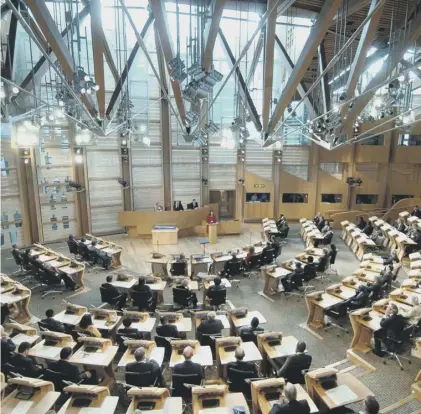  ??  ?? 0 The horseshoe shape of the debating chamber was chosen to help facilitate reasonable debate