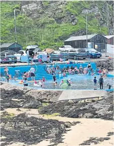  ??  ?? Splashing about at the Portknocki­e pool.