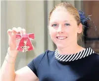  ??  ?? ●●Heather Knight with her OBE, which was presented to her by the Prince of Wales at Buckingham Palace