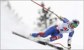  ?? MARCO TORVATI - THE ASSOCIATED PRESS ?? Lindsey Vonn of the United States speeds down the course during the women’s World Cup super-G in Bad Kleinkirch­heim, Austria, on Saturday.