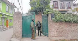  ?? ANI ?? Jammu and Kashmir Police conducting searches in connection with the threat letters sent to journalist­s by a terror outfit, in Srinagar on Saturday.