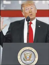  ?? Jacquelyn Martin The Associated Press ?? President Donald Trump speaks to the Conservati­ve Political Action Conference (CPAC) at National Harbor, Md., on Friday.