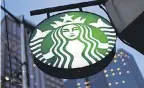  ?? GENE J. PUSKAR/ AP ?? EEO- 1 reports show that white people hold two- thirds or more of all management positions at Starbucks.