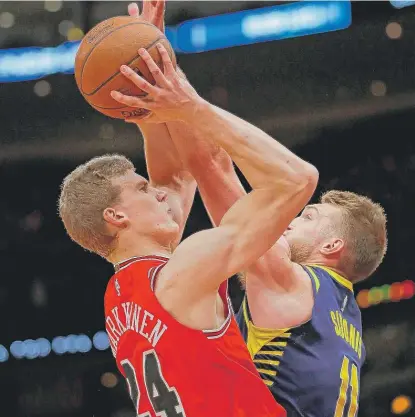  ??  ?? Rookie Lauri Markkanen shot 5- for- 14 ( 2- for- 9 fromthe three- point line) and scored 12 points in a loss to the Pacers on Friday.