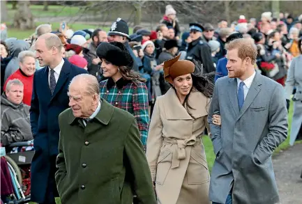  ?? PHOTO: GETTY IMAGES ?? Meghan Markle and Prince Harry, right, attend Christmas Mass at the Church of St Mary Magdalene in King’s Lynn with Prince William, left, Prince Philip and Catherine, Duchess of Cambridge.