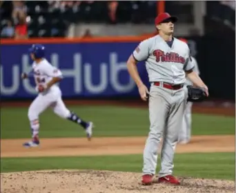  ?? JULIE JACOBSON — THE ASSOCIATED PRESS ?? Jeremy Hellickson, right, will likely be dealt soon by the Phillies. The veteran pitcher can consistent­ly get his club into the sixth inning, but with a career record just above .500 there’s no telling what value he will have on the trade market.