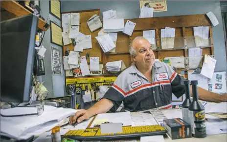  ??  ?? Harry Gilarno, owner of Gilarno's Auto Repair in Freedom, is finding it hard to hire employees. “You can’t find blue-collar workers in this business who want to work,” he said.