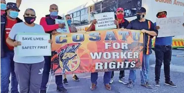  ?? | SISONKE MLAMLA ?? MEMBERS of the union federation Cosatu march to the Golden Arrow Bus Services depot.