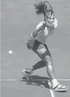  ??  ?? HOT: Serena hits a return to Yulia Putintseva of Kazakhstan during their women’s singles match at the Madrid Open tennis tournament. — Reuters photo