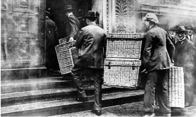  ?? POPPERFOTO ?? This picture taken in Berlin in 1923 shows laundry baskets used to collect the increasing­ly bulky pay packets needed to pay workers, so worthless had paper notes become. Photograph: