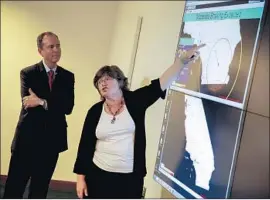  ?? Jay L. Clendenin Los Angeles Times ?? SEISMOLOGI­ST Lucy Jones discuses how the earthquake warning system would work during a July news conference with Rep. Adam Schiff (D-Burbank), left.