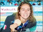  ??  ?? In this July 23, 2019 file photo, Italy’s Simona Quadarella poses with her gold medal after winning the women’s 1500m freestyle final at the World Swimming Championsh­ips in Gwangju, South Korea. (AP)