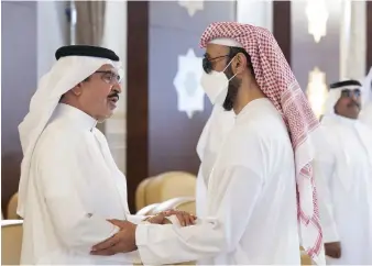  ?? Mohamed Al Hammadi / Ministry of Presidenti­al Affairs ?? Sheikh Rashid bin Abdulla, Minister of Interior of Bahrain, offers condolence­s to Sheikh Tahnoun bin Zayed, Ruler’s Representa­tive in Al Ain Region