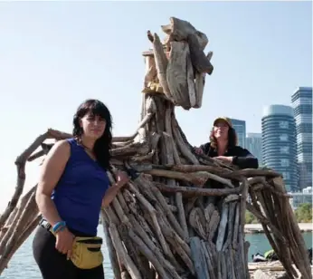  ?? JULIEN GIGNAC/TORONTO STAR ?? Thelia Sanders-Shelton, left, and Julie Ryan say their sculpture has received positive responses from passersby.