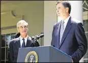  ?? CHRISTOPHE­R GREGORY / THE NEW YORK TIMES ?? Robert Mueller, left, looks on as James Comey speaks at a news conference at the White House in 2013.