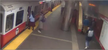  ?? MBTA VIDEO SCREENGRAB. ?? A 25-pound ceiling tile falls at the Harvard Red Line station March 1, just missing a rider.