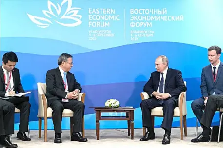  ?? XINHUA ?? RUSSIAN President Vladimir Putin (second from right) meets with Chinese Vice Premier Hu Chunhua (second from left) on the sidelines of the fifth Eastern Economic Forum in Vladivosto­k Thursday.