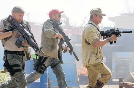  ?? Phil Bray Lionsgate ?? “THE EXPENDABLE­S 3,” with Randy Couture, left, Jason Statham and Sylvester Stallone, is among many films that have been pirated.