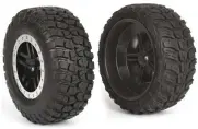  ??  ?? Short-course truck tires are dual-diameter—note how much larger the back of the wheel is.