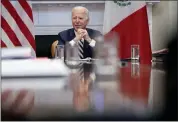  ?? ANDREW HARNIK — THE ASSOCIATED PRESS ?? President Joe Biden speaks during a virtual meeting with Mexican President Andres Manuel Lopez Obrador, in the Roosevelt Room of the White House on Monday in Washington.