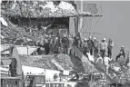  ?? MARK HUMPHREY/AP, FILE ?? The oceanfront Champlain Towers South building that collapsed on June 24, killing 98 people in Surfside, Fla., was built in 1981.