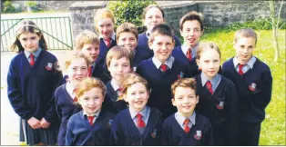  ?? ?? Pupils from Grange National School who won medals at the swimming gala in Fermoy Leisure Centre 21 years ago.