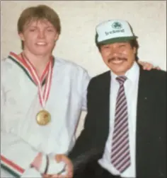  ??  ?? Master Yau with Bobby O’Neill after Bobby won his second world kickboxing title in 1989 in Graz, Austria.