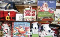  ??  ?? Holiday items are on display at Michele’s Hallmark. Owner Michele Maresca said her customer traffic quadruples during the holiday season, with the postal service playing a big role.