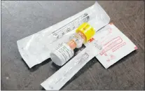  ?? GLEN WHIFFEN/THE TELEGRAM ?? Hydrocorti­sone vial — that costs less than $5 — and injection supplies needed to administer the medication to someone in adrenal crisis.