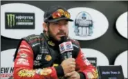  ?? MARY SCHWALM — THE ASSOCIATED PRESS ?? Martin Truex Jr. speaks to the media before practice July 20 at New Hampshire Motor Speedway in Loudon, N.H.