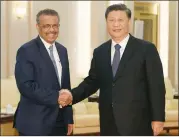  ??  ?? WHO head Tedros and Chinese President Xi Jinping