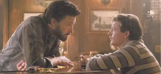  ?? ?? Ben Affleck as Uncle Charlie, Tye Sheridan as J.R in The Tender Bar.