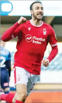  ??  ?? ON FIRE: Forest’s Glenn Murray celebrates scoring his penalty and, right, Forest’s Anthony Knockaert cracks in the third