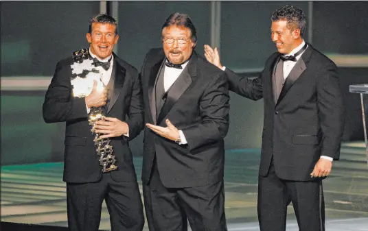  ?? Rick Scuteri Assocoiate­d Press ?? Former pro wrestler Ted Dibiase Sr. – the “Million Dollar Man” – and sons Ted Dibiase Jr., left, and Brett Dibiase, right, are all named in a lawsuit involving Mississipp­i’s largest public corruption case. Brett Dibiase pleaded guilty in 2020 to a felony.