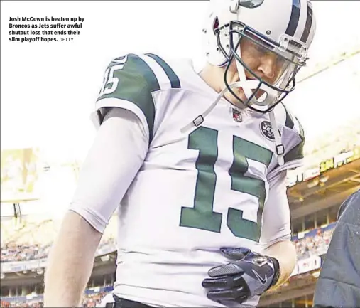  ?? GETTY ?? Josh McCown is beaten up by Broncos as Jets suffer awful shutout loss that ends their slim playoff hopes.