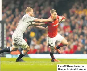  ??  ?? Liam Williams takes on George Kruis of England.