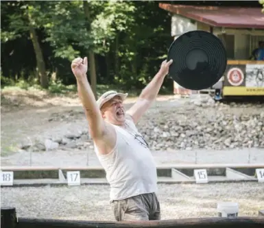  ?? GIANNI CIPRIANO PHOTOS/THE NEW YORK TIMES ?? Giancarlo Rolando, 63, celebrates victory at the Italian Goldpannin­g Championsh­ip in the Bessa Reserve in Zubiena, Italy.