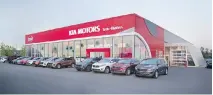  ?? PHOTOS COURTESY OF KIA CANADA ?? Kia Trois-Rivières in Quebec is one of the first dealership­s in Canada to adopt Kia’s new global Red Cube image, including large glass frontage with red exterior panels, a bright and airy showroom, enclosed service drivethru and new-car delivery areas.