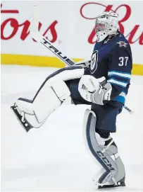  ?? CANADIAN PRESS FILE PHOTO ?? “It would definitely be crazy,” said Connor Hellebuyck. “But just the fact that we’d get to play again would be awesome.”