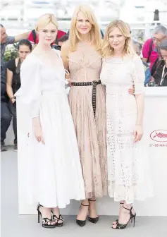  ??  ?? Elle Fanning, Nicole Kidman and Kirsten Dunst attend the The Beguiled photocall during the 70th annual Cannes Film Festival at Palais des Festivals on May 24, 2017 in Cannes, France.