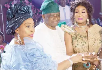  ?? ?? From left: Wife of the former Vice President, Titi Atiku; former Deputy Chief of Staff to the President, Olusola Akanmode and celebrant, Princess Maryam Akanmode during her 60th birthday at the Aso Villa Abuja weekend