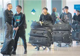  ??  ?? Members of Wuhan Zall arrive in Malaga last month.