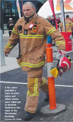  ?? Pictures: JAY TOWN ?? A fire alarm provided a scare as extra police and safety checks were rolled out at Simonds Stadium in the wake of the Manchester bombing.